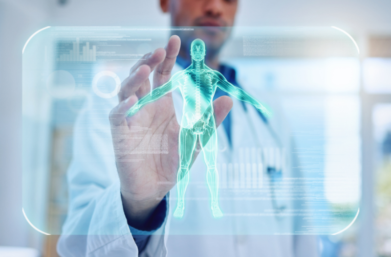 Clinician interacting with a holographic patient model